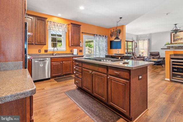 1209 Stevenage Ct, Abingdon, MD 21009 - kitchen featuring stainless steel appliances, beverage cooler, light wood-style floors, a kitchen island, and recessed lighting