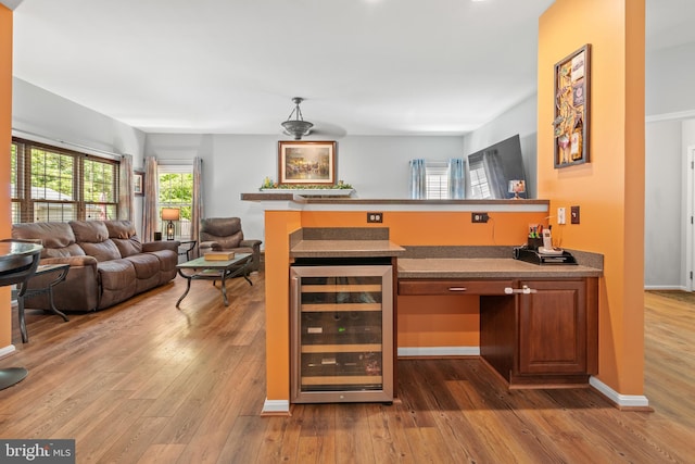1209 Stevenage Ct, Abingdon, MD 21009 - bar area with beverage cooler and hardwood / wood-style flooring