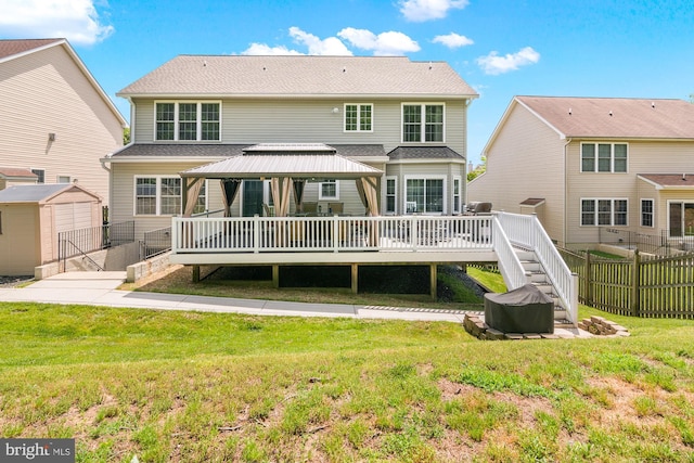 1209 Stevenage Ct, Abingdon, MD 21009 - back of house with a gazebo, a wooden deck, and an outdoor structure