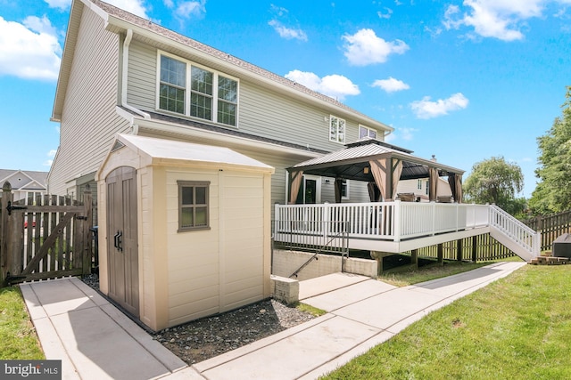 1209 Stevenage Ct, Abingdon, MD 21009 - back of house featuring a gazebo, a gate, a deck, and a yard