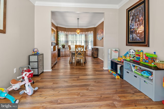 1209 Stevenage Ct, Abingdon, MD 21009 - recreation room featuring crown molding, wood finished floors, and baseboards