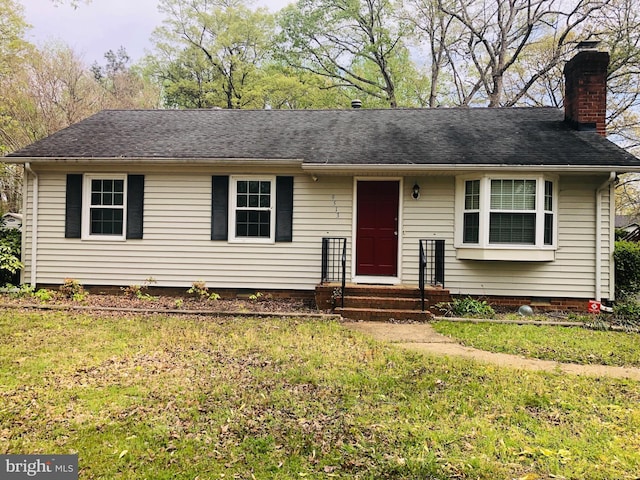 9513 Snowbird Rd, Chesterfield, VA 23832 - ranch-style home with a chimney and a front yard