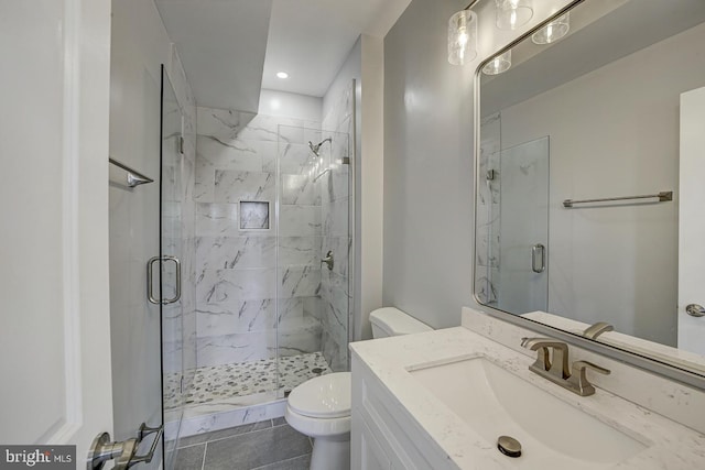 832 19th St NE Unit B, Washington, DC 20002 - bathroom featuring toilet, a marble finish shower, vanity, and recessed lighting