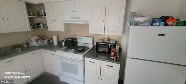 218 Stroud St, Wilmington, DE 19805 - kitchen with white appliances, custom range hood, white cabinetry, tasteful backsplash, and open shelves