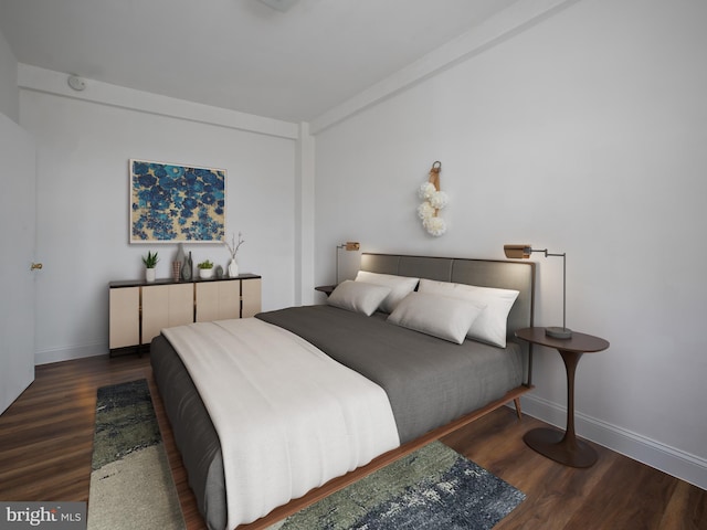 2515 K St NW Unit 807, Washington, DC 20037 - bedroom with wood finished floors and baseboards