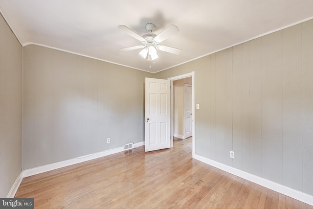 4208 Longfellow St, Hyattsville, MD 20781 - unfurnished room with a ceiling fan, light wood finished floors, and ornamental molding