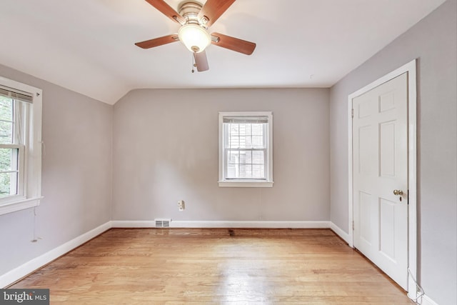 4208 Longfellow St, Hyattsville, MD 20781 - unfurnished bedroom with light wood-style flooring, lofted ceiling, and a ceiling fan