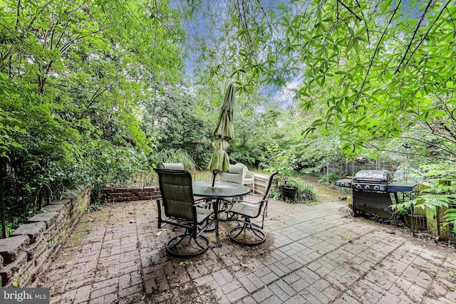4208 Longfellow St, Hyattsville, MD 20781 - view of patio featuring outdoor dining space and a grill