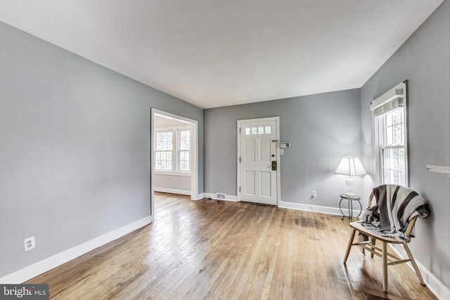 4208 Longfellow St, Hyattsville, MD 20781 - foyer with baseboards and wood-type flooring