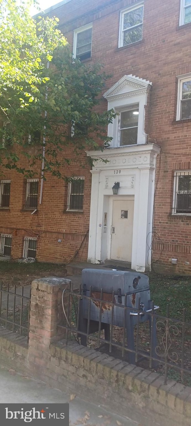 120 Danbury St SW Unit 120-C, Washington, DC 20032 - view of front of home featuring brick siding