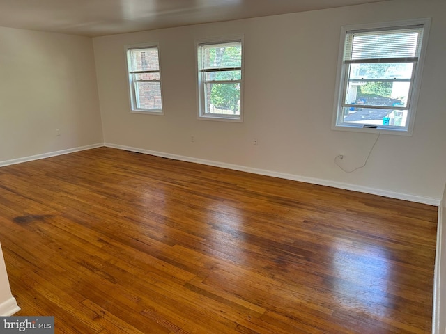 120 Danbury St SW Unit 120-C, Washington, DC 20032 - spare room featuring wood finished floors and baseboards