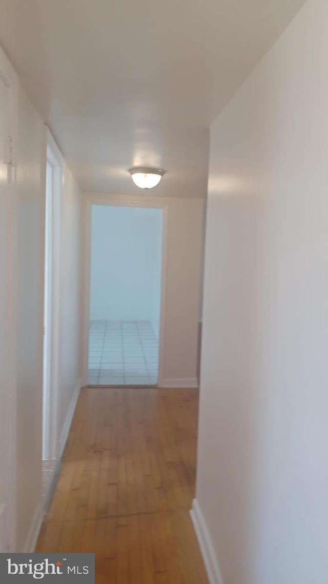 120 Danbury St SW Unit 120-C, Washington, DC 20032 - corridor with light wood finished floors and baseboards