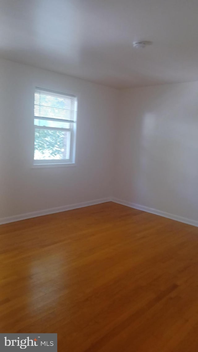 120 Danbury St SW Unit 120-C, Washington, DC 20032 - unfurnished room featuring light wood-style flooring and baseboards