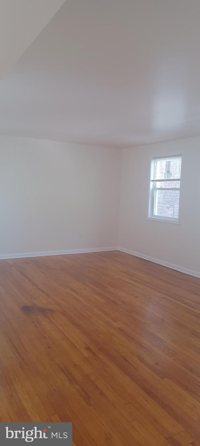 120 Danbury St SW Unit 120-C, Washington, DC 20032 - unfurnished room with light wood-style flooring and baseboards