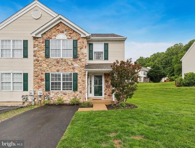 3708 Swetland Dr, Doylestown, PA 18902 - view of front of house with stone siding, a front lawn, and roof with shingles