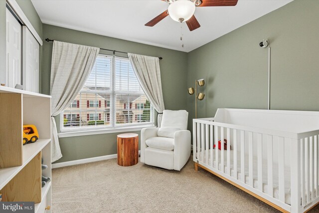 3708 Swetland Dr, Doylestown, PA 18902 - carpeted bedroom featuring baseboards, a crib, a closet, and ceiling fan