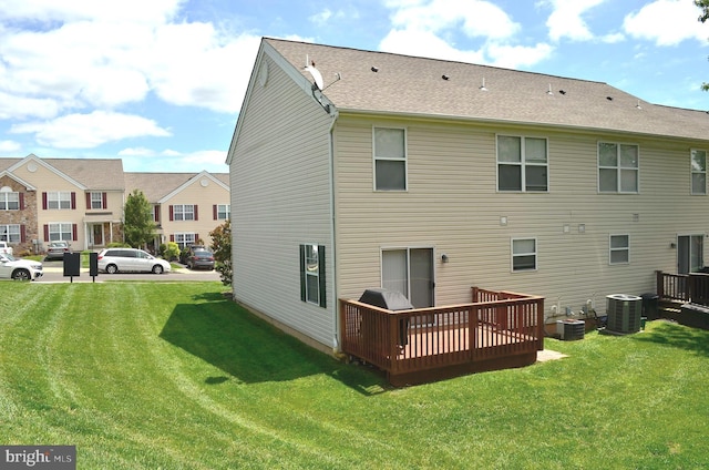3708 Swetland Dr, Doylestown, PA 18902 - rear view of house featuring central air condition unit, a deck, and a lawn