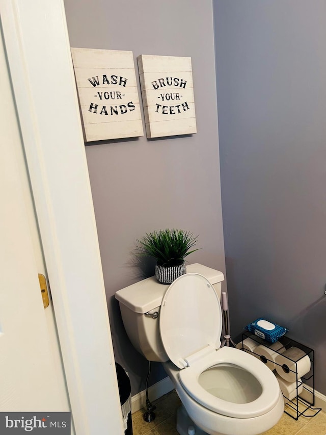 99 Berkley Rd, Reading, PA 19605 - bathroom with baseboards, tile patterned flooring, and toilet