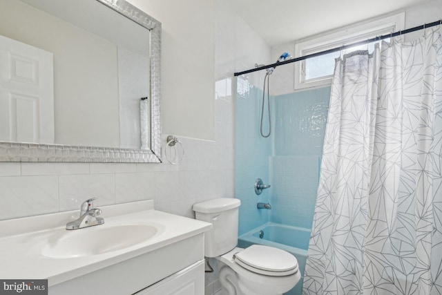 508 Weeks Ave, Riverside, NJ 08075 - bathroom featuring tile walls, shower / tub combo with curtain, vanity, and toilet