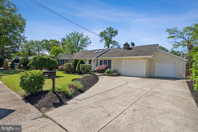 508 Weeks Ave, Riverside, NJ 08075 - ranch-style house with an attached garage, driveway, a front lawn, and a chimney