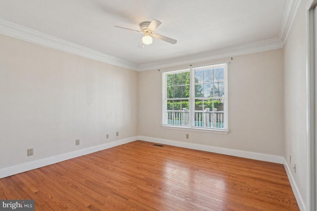 508 Weeks Ave, Riverside, NJ 08075 - spare room with ornamental molding, ceiling fan, wood finished floors, and baseboards