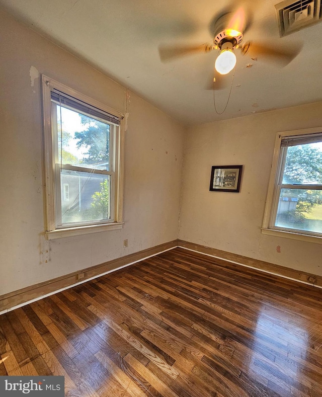 30292 Vines Creek Rd, Dagsboro, DE 19939 - empty room with wood finished floors, ceiling fan, and baseboards
