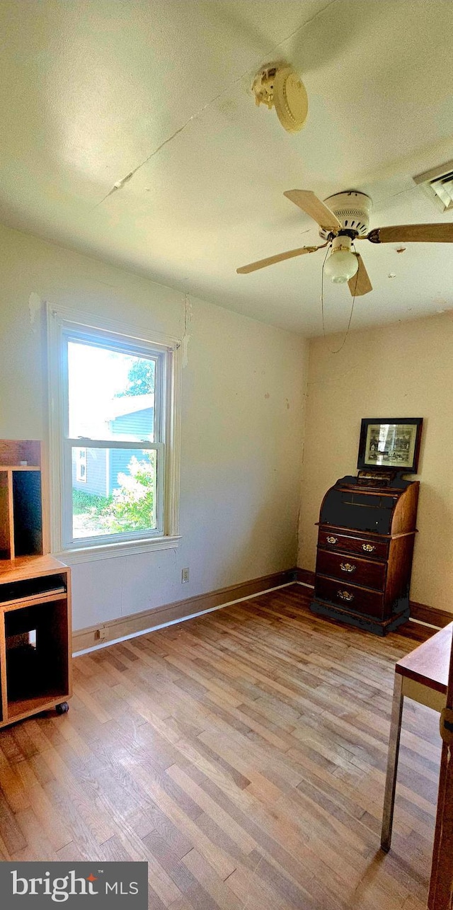 30292 Vines Creek Rd, Dagsboro, DE 19939 - living area with wood finished floors, baseboards, and ceiling fan