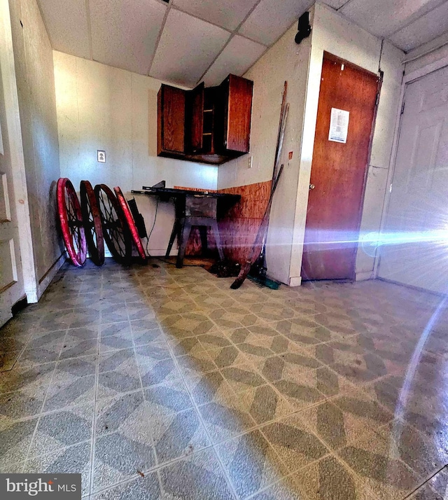 30292 Vines Creek Rd, Dagsboro, DE 19939 - kitchen featuring a paneled ceiling and stone finish floors