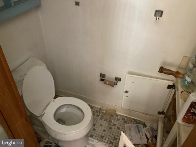 3121 University Blvd W Unit 3, Kensington, MD 20895 - half bathroom featuring toilet and tile patterned flooring