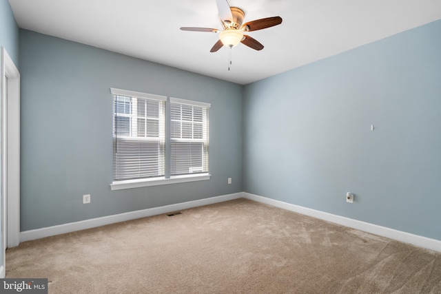409 Pear Blossom Rd, Stafford, VA 22554 - spare room with carpet flooring, ceiling fan, and baseboards