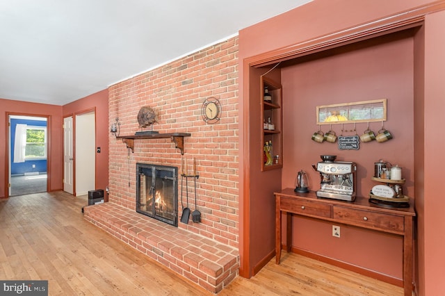 4210 Mcintosh Rd, Harrisburg, PA 17112 - living area with hardwood / wood-style flooring, a fireplace, and baseboards