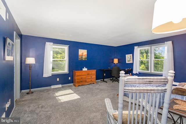 4210 Mcintosh Rd, Harrisburg, PA 17112 - carpeted bedroom with multiple windows, an office area, and baseboards