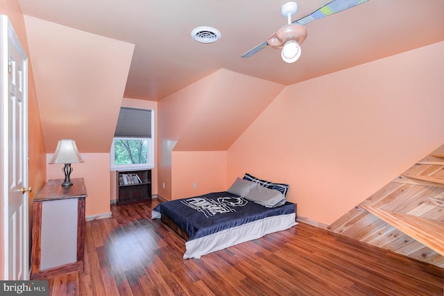 4210 Mcintosh Rd, Harrisburg, PA 17112 - bedroom featuring wood finished floors, vaulted ceiling, baseboards, and a ceiling fan