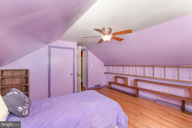 4210 Mcintosh Rd, Harrisburg, PA 17112 - bedroom with wood finished floors, lofted ceiling, baseboards, and ceiling fan