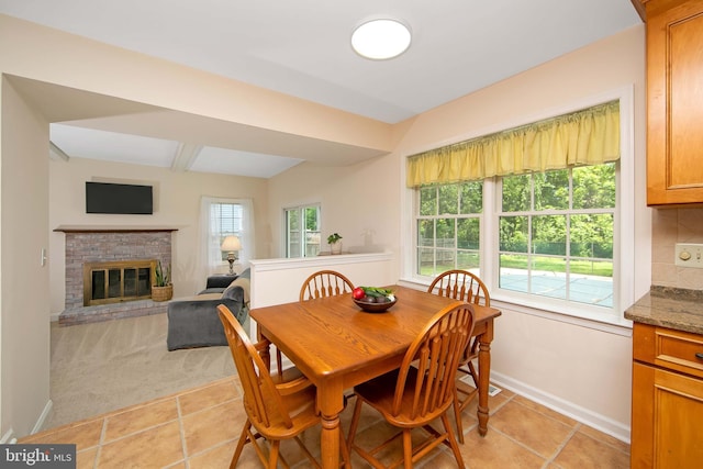108 Holiday St, Mount Laurel, NJ 08054 - dining area with a fireplace, light tile patterned flooring, and baseboards