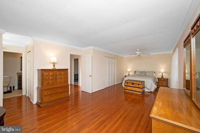 108 Holiday St, Mount Laurel, NJ 08054 - bedroom with light wood-style floors, crown molding, a closet, baseboards, and a ceiling fan