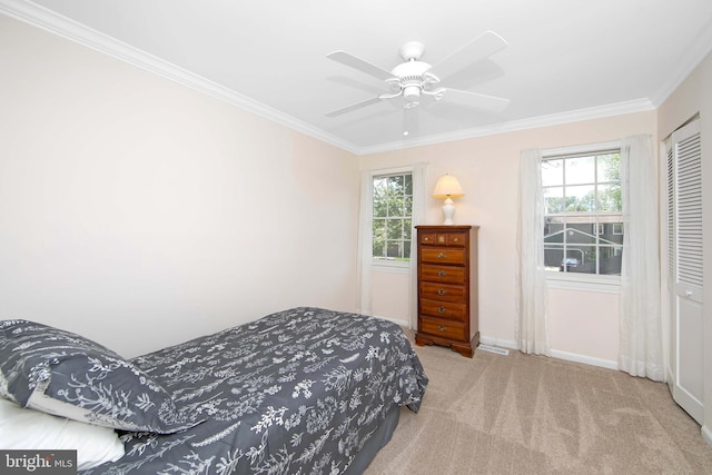 108 Holiday St, Mount Laurel, NJ 08054 - bedroom featuring carpet, crown molding, a closet, baseboards, and a ceiling fan