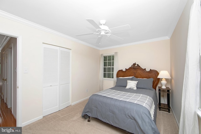 108 Holiday St, Mount Laurel, NJ 08054 - bedroom with ornamental molding, light carpet, a closet, baseboards, and ceiling fan