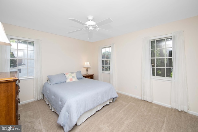 108 Holiday St, Mount Laurel, NJ 08054 - bedroom with baseboards, light colored carpet, and ceiling fan