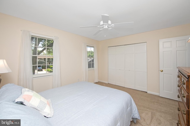 108 Holiday St, Mount Laurel, NJ 08054 - bedroom featuring light carpet, a closet, baseboards, and ceiling fan