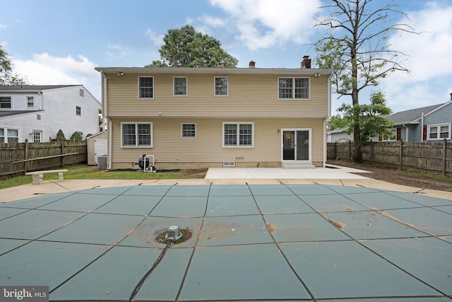 108 Holiday St, Mount Laurel, NJ 08054 - rear view of house with a patio, a fenced backyard, central air condition unit, a chimney, and entry steps