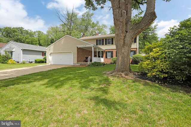 108 Holiday St, Mount Laurel, NJ 08054 - view of front facade with brick siding, a garage, a front yard, and driveway