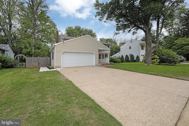 108 Holiday St, Mount Laurel, NJ 08054 - view of front facade featuring a garage, a chimney, and driveway