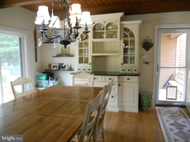 22 Hart Ln, Sewell, NJ 08080 - dining space with a chandelier and light wood-style flooring