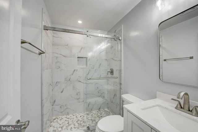 832 19th St NE Unit C, Washington, DC 20002 - bathroom featuring a marble finish shower, toilet, vanity, and recessed lighting