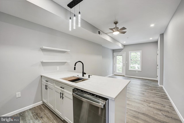 832 19th St NE Unit C, Washington, DC 20002 - kitchen with stainless steel dishwasher, a sink, a peninsula, ceiling fan, and open shelves