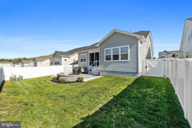 4387 Shakespeare Cir, White Plains, MD 20695 - back of house with a gate and a patio