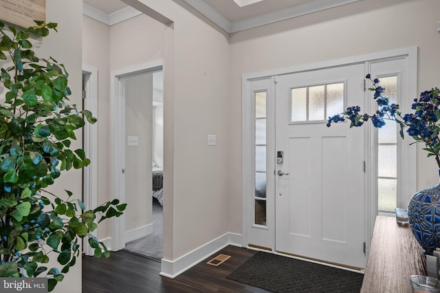 4387 Shakespeare Cir, White Plains, MD 20695 - foyer entrance with dark wood finished floors, ornamental molding, and baseboards