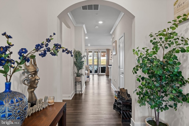 4387 Shakespeare Cir, White Plains, MD 20695 - hall with wood finished floors, ornamental molding, baseboards, recessed lighting, and arched walkways