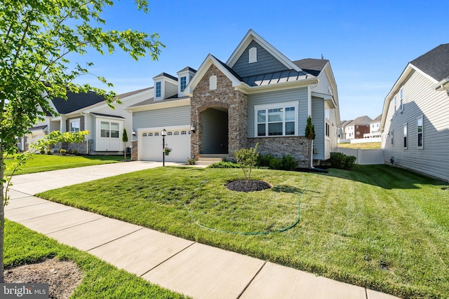 4387 Shakespeare Cir, White Plains, MD 20695 - craftsman inspired home with stone siding, a standing seam roof, concrete driveway, a garage, and metal roof